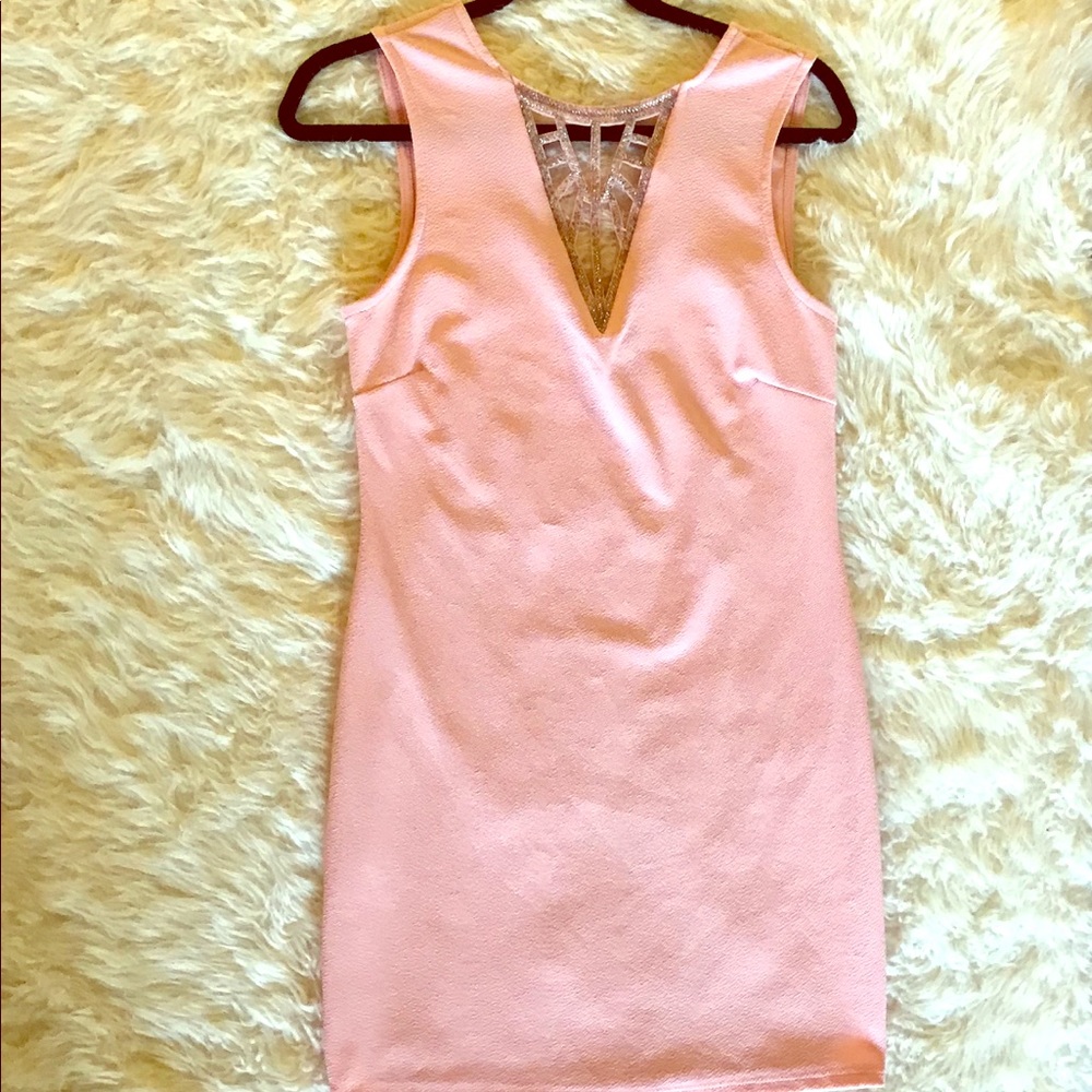 Light peach dress with beated v-neck accessory